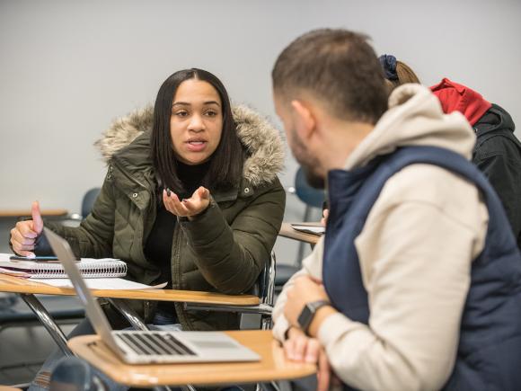 Two students working on a project in a criminal justice class.