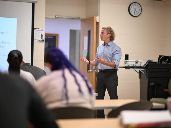 ABA faculty member teaching in a classroom.