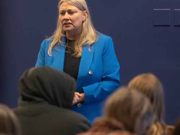 Professor Tamara Smith speaks to a group of students