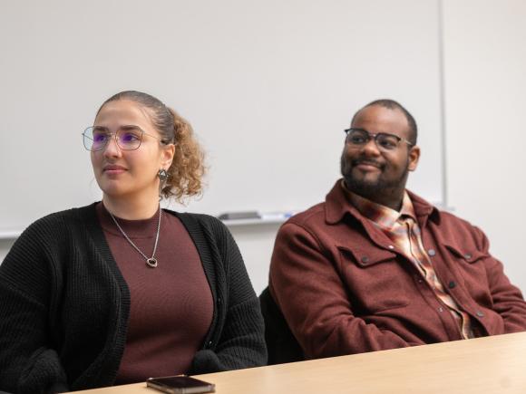 Two alumni participating in an HR leadership training event.