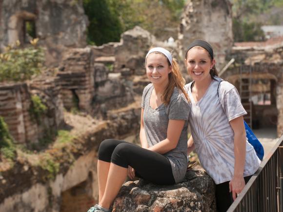 Two students smiling together during a study trip in Guatemala.