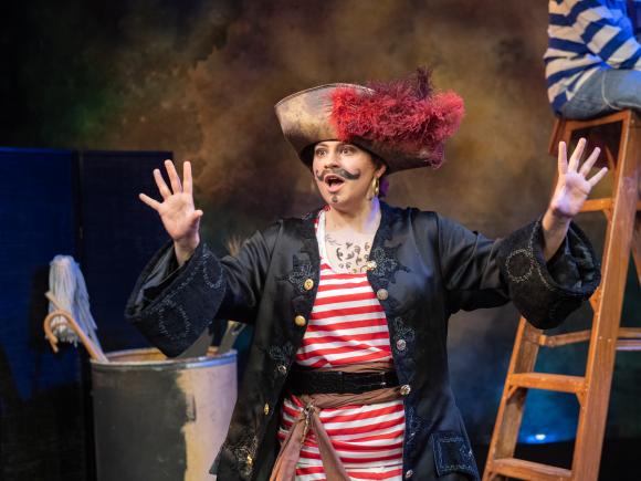 Student wearing pirate costume in production Peter and the Star Catcher.