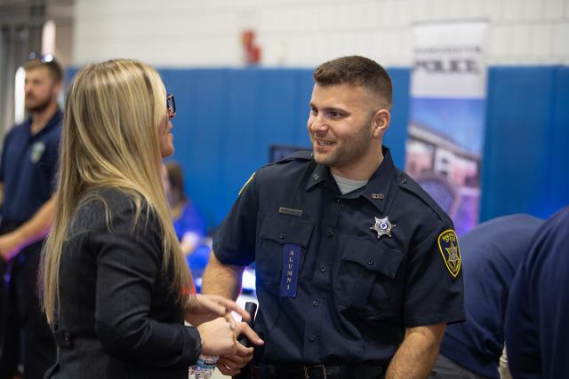 Criminal justice alumni at Career Fair.