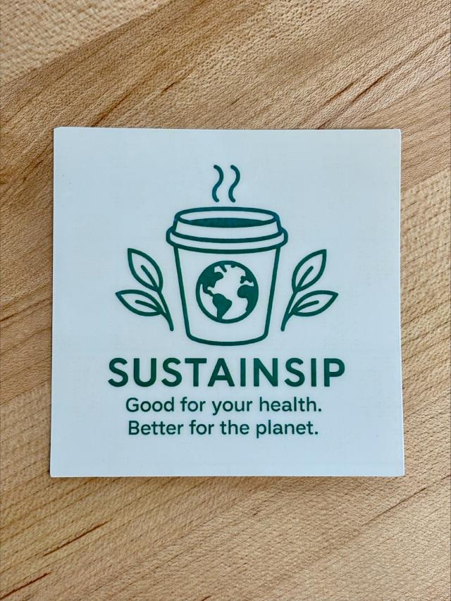 sticker with green lettering "sustainship: good for your health, better for the planet" and an image of a steaming coffee cup with green leaves on each side