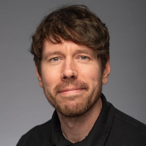 Headshot of Brandon Fredette.