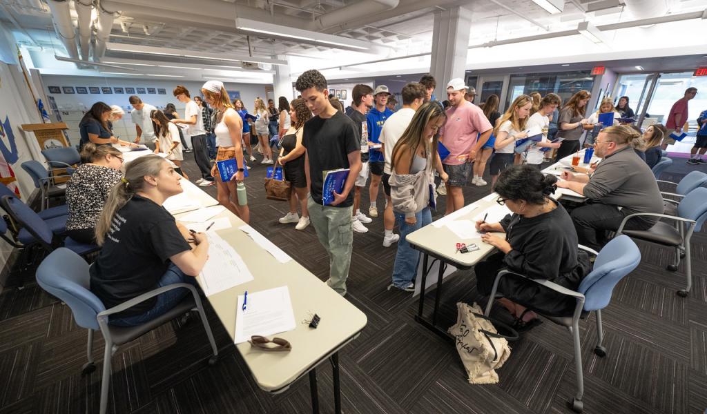 New Student Orientation resource tables with students, faculty, and staff.